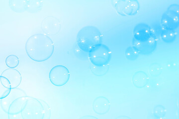 Fototapeta na wymiar Fresh blue soap bubbles natural background.