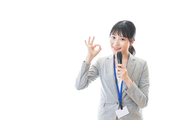 Fototapeta premium プレゼンをする若いビジネスパーソン