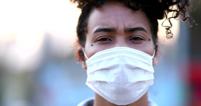 Close-up Black Woman Portrait Wearing Face Mask, Person Raising Fist