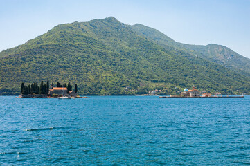 Fototapeta premium View to The Island of Saint George and Our Lady of the Rocks islet, Perast, Bay of Kotor, Montenegro