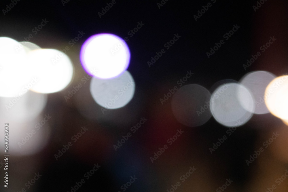 Poster blurred light with bokeh background of temple fair in thailand.abstract blurred circular bokeh backg