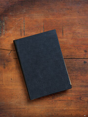 Vintage book on wooden background, copy space