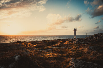 Lighthouse during golden sunset on the Swedish west coast Varberg. © PhotosbyPatrick