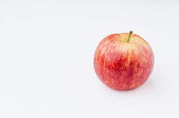 Red apple, with white background. Asturias, Spain