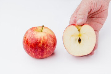 Red apple, with white background. Asturias, Spain