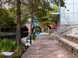 sidewalk along the waterway in the Woodlands, TX.