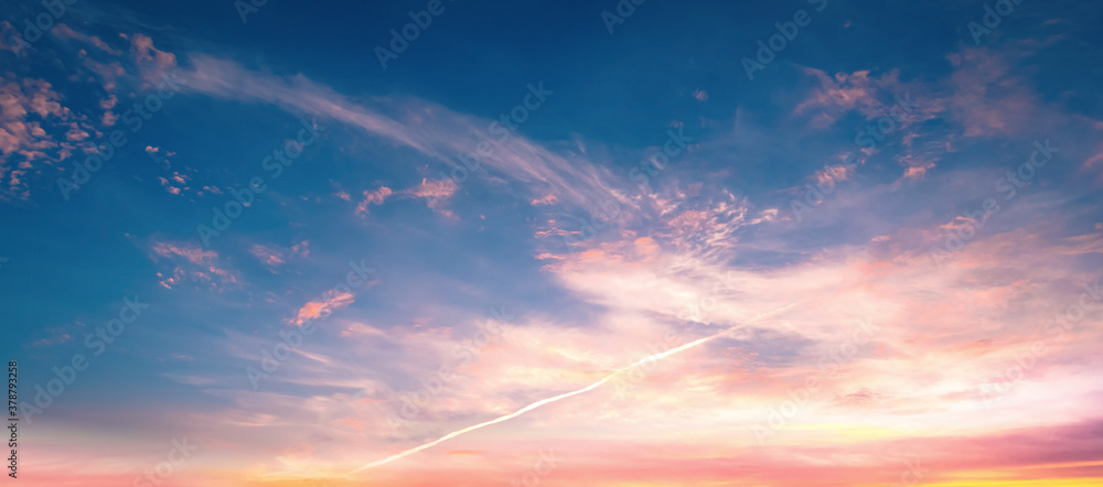 Wall mural world environment day concept: dramatic autumn sunset with twilight color sky and clouds background