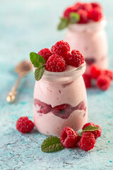 Jars of homemade berry yogurt.