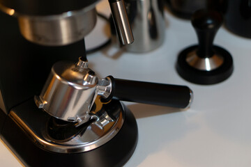 Professional coffee machine making espresso in a cafe