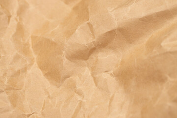 Crumpled paper texture. Macro shot. Selective focus.