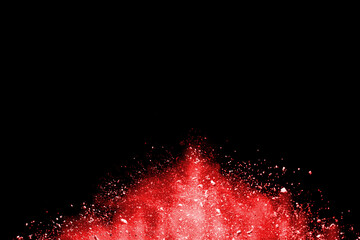 Launched red powder on white background.