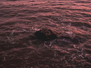 The rock in the water