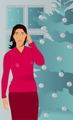 Portrait of a woman standing in front of a decorated Christmas tree