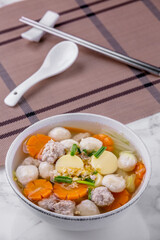 Clear soup with tofu and minced pork