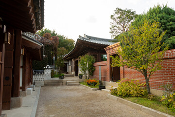 Naklejka premium Korean Architecture on a street in Bukchon Hanok Village in Seoul, South Korea