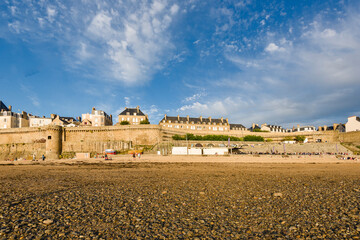 Waterfront view of beach townhouses and skyline, Saint-Malo, Brittany, France