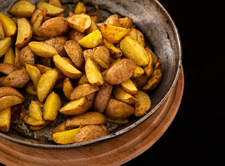 Golden potatoes in a cast iron skillet