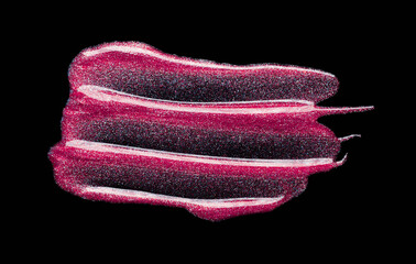 Shimmering lipgloss swatch isolated on black