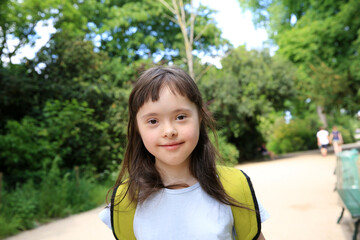 Portrait of little girl smiling in the park