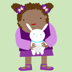 Portrait of a girl holding a rabbit