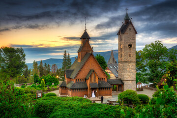 Fototapeta na wymiar Beautiful Vang Stave Church in karpacz at sunset, Poland