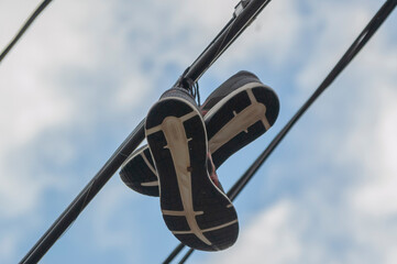 Shoes on a power line
