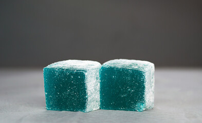 blue delicious Turkish Delight on gray background
