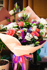 Bouquet of different flowers close up. Light photo
