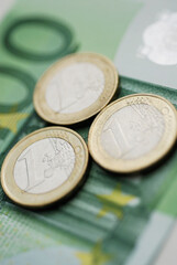 Close-up of Euro notes and coins