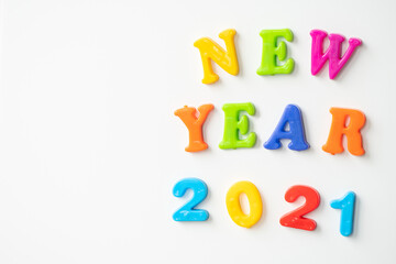 new year 2021 on a white background. It is laid out in colored letters and numbers