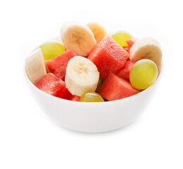 Fresh fruit salad on a plate, isolated on a white background