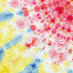 Tie dyed pattern on cotton fabric for background.