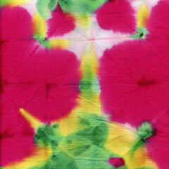 Tie dyed pattern on cotton fabric for background.