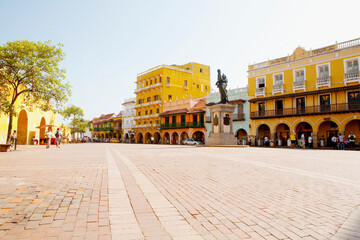 Fototapeta na wymiar Buildings in a city, Plaza De Los Coches, Cartagena, Bolivar, Colombia