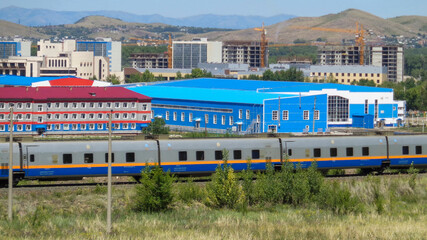 Obraz na płótnie Canvas View of the city of Ust-Kamenogorsk (kazakhstan). Passenger train