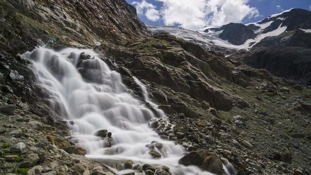 Majestic Waterfall Cascading On The Rocky Susten Pass, Steingletscher, Switzerland - time lapse