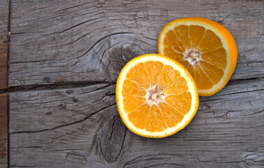 Wooden background and oranges for text or images