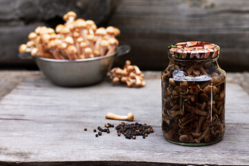 mushrooms in a glass jar, homemade pickles