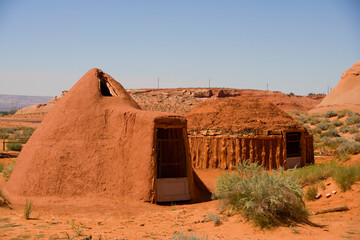 Navajo Hogan on an arid landscape, Navajo Village Heritage Center, Page, Arizona, USA