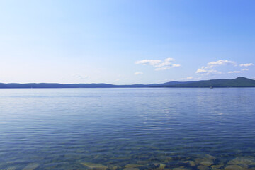 Wonderful view of the lake and mountains. Background. Landscape.