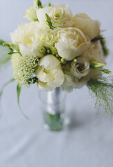 bouquet in the hands of the bride
