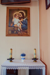 Church sanctuary before a wedding ceremony. Empty chairs for bride and groom.