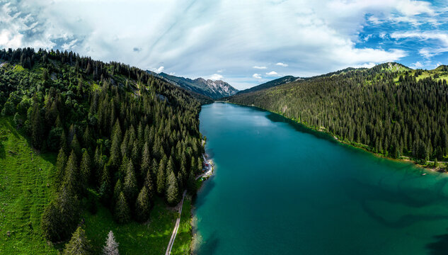 Lost in the mountains of Switzerland, Lake Arnesee with crystal clear waters of turquoise and azure colors.