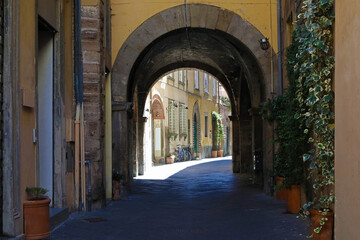 Fototapeta na wymiar Old street in Lucca, Italy
