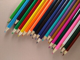 color pencils on a white background