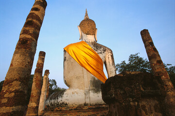 Old ruins of statue of Buddha in a temple, Wat Mahathat, Sukhothai Historical Park, Sukhothai,...