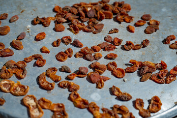 close-up drying apricots in the sun