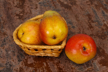 Pear heap in the wooden basket