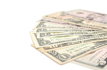 different dollars fanned on a white background. Financial concept. Copy of space.