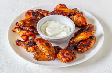 Barbecue chicken wings on a white background. Grill. Recipe.